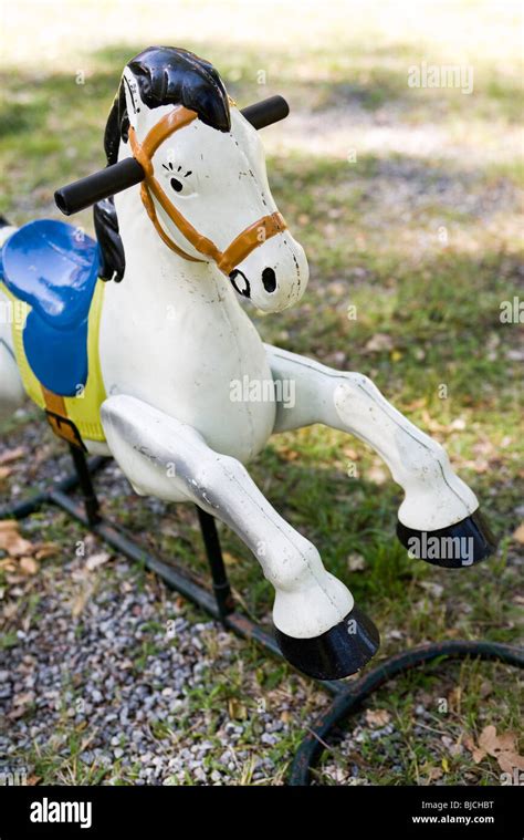 Rocking Horse In Park Stock Photo Alamy