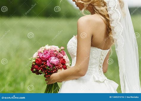 And Beautiful Blonde Model Girl With Perfect Body In Wedding Dress