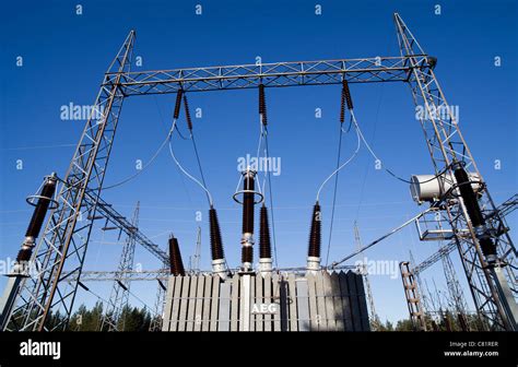 Large AEG step-up transformer at hydroelectric power plant. Raising ...