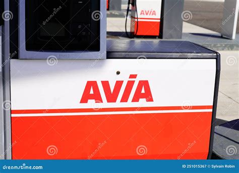 Avia Logo Text And Brand Sign On Petrol Pump Nozzles On A Gas Service