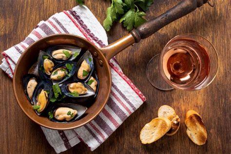 Free Photo Top View Tasty Mussels With Glass Of Wine