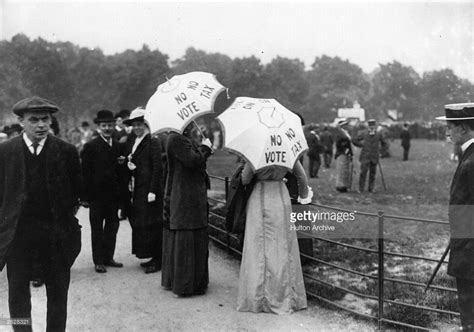 Suffragettes Help The Cause By Carrying Umbrellas With The Slogan No Vote No Tax In London S