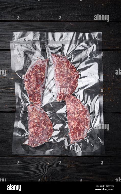Vacuum Beef Or Lamb Mutton Cutlet Sealed Airtight Pack Set On Black