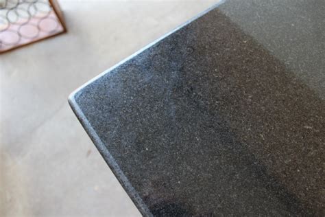 Sleek Black Granite Dining Table 67508