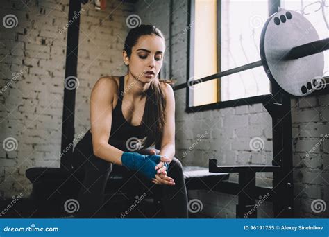 Young Woman Having Some Rest After Hard Workout In Gym Stock Image Image Of Attractive Fists