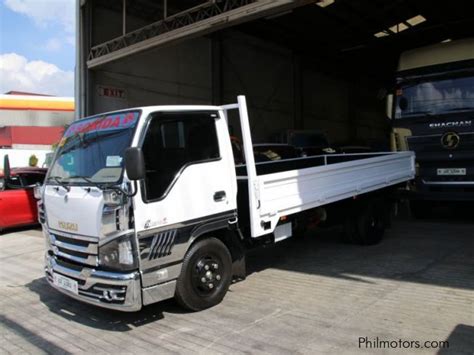 Used Isuzu Elf NKR Dropside 6 Wheel Truck 2021 Elf NKR Dropside 6