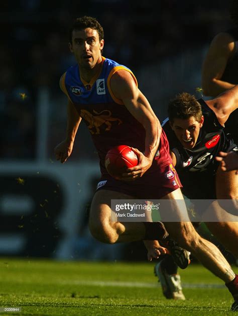 Nigel Lappin Of The Lions Breaks Clear Of Jarrad Waite Of The Blues