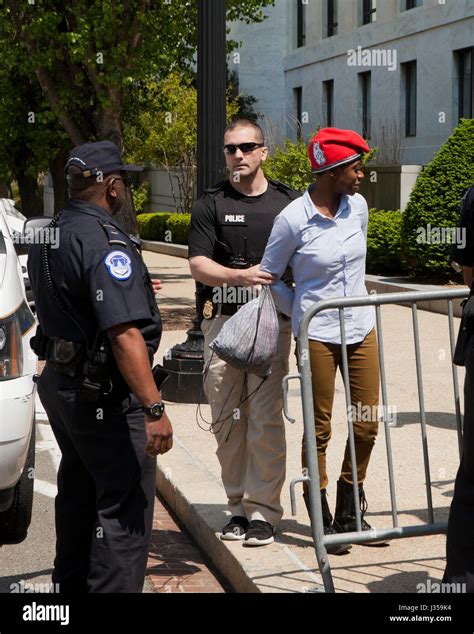 Woman arrested and handcuffed by US Capitol Police - Washington, DC USA Stock Photo - Alamy