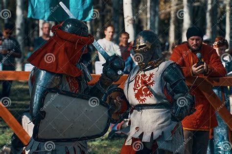 Two Knights In Armor Imitate A Sword Fight Editorial Stock Photo