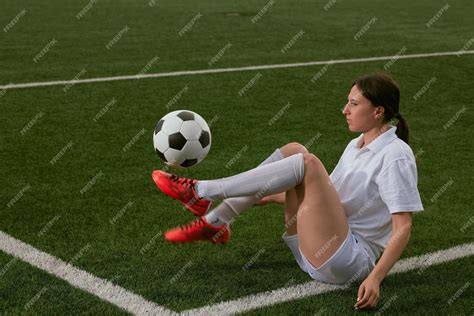 Premium Photo Sports Girl Football Player With A Soccer Ball On The