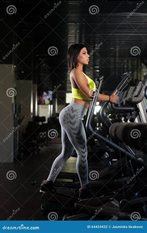 Latina Women On Elliptical Treadmill In Fitness Gym Stock Photo Image