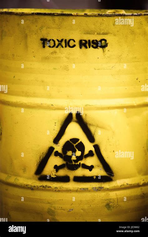 Toxic waste symbol on a yellow barrel Stock Photo - Alamy