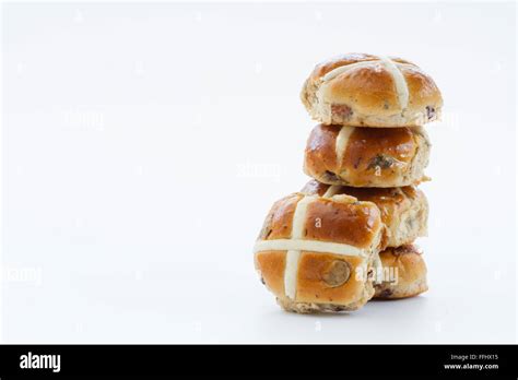 A Stack Of Easter Holiday Hot Cross Buns On An Isolated White Background Stock Photo Alamy
