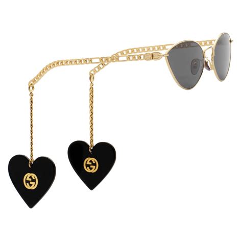 Gucci Cat Eye Sunglasses With Heart Shaped Charms Gold Gray Gucci