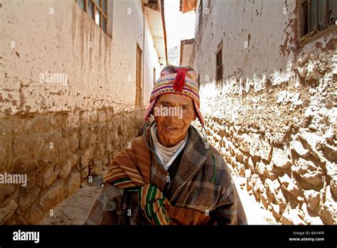 Inca Peasant In An Alley In Pisac Peru South America Stock Photo Alamy