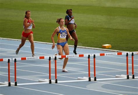 Athletes in the 400 Meters Hurdles Editorial Stock Image - Image of compete, competitors: 26160109