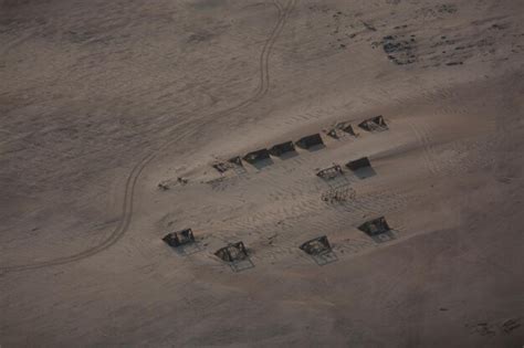 premium photo aerial view  built structures  desert