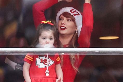 Taylor Swift Has Cute Moment with Mystery Kid in Chiefs Suite on Christmas