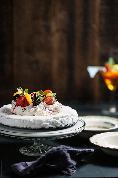 Summer Fruit Pavlova On Table By Stocksy Contributor Darren Muir Stocksy