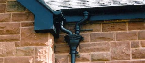 Heritage Buildings With Cast Iron Gutters Downpipes And Hopper Heads