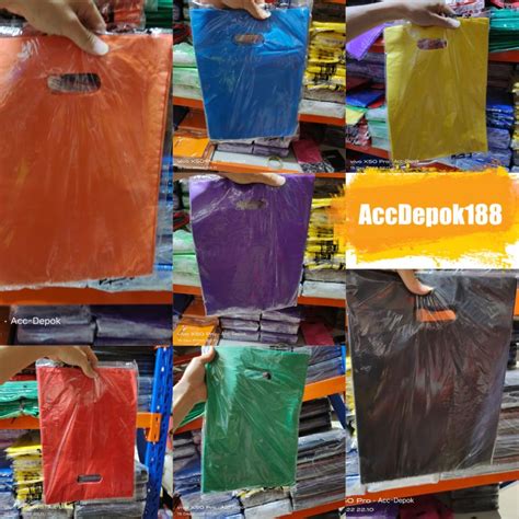 Jual Isi 100 PCS Kantong Plastik Pond Packing Shop 30x38 Oval Plong