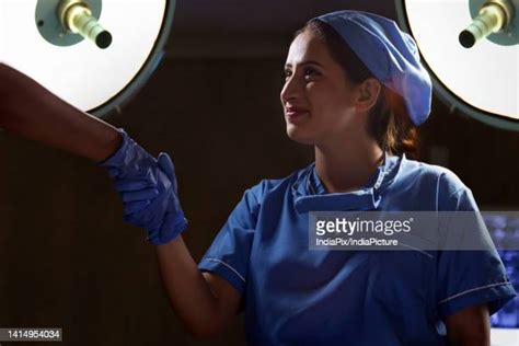 Surgical Gloves Handshake Photos And Premium High Res Pictures Getty