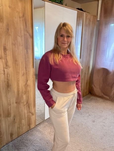 Middle Aged Blonde Sweet Susi Is Captured In States Of Dress And Undress NakedPics