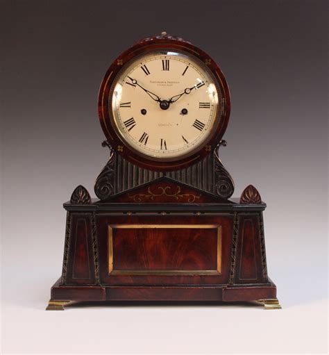 A Regency Mahogany Cased Mantel Clock With Eight Day Twin Fusee