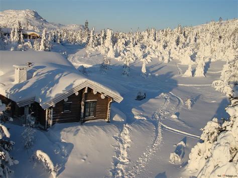 Snow-covered cabin in the mountains HD wallpaper download