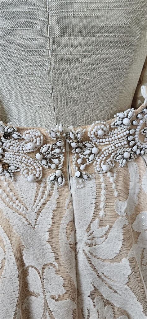 Beautiful White And Nude Beaded And Sequined MacDouga Gem