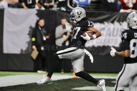 Las Vegas Raiders Star Player Davante Adams Scoring a Touchdown at Allegiant Field in Las Vegas ...