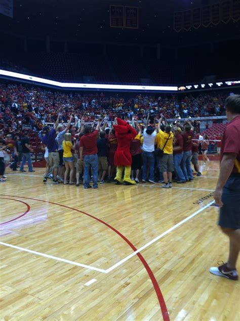 Fans Rush The Court After The Cyclone Volleyball Team Defeats