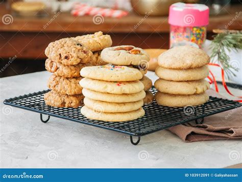 Stack Of Different Festive Cookies On A Wire Rack Preparation T Stock