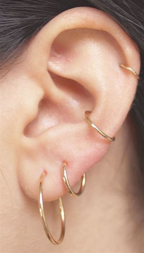 Two Piercings On Ear