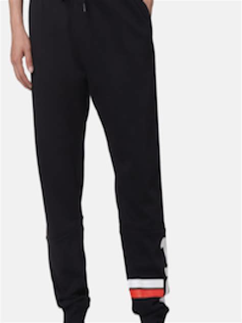 Buy Fila Men Black Solid Joggers Track Pants For Men 13197668 Myntra