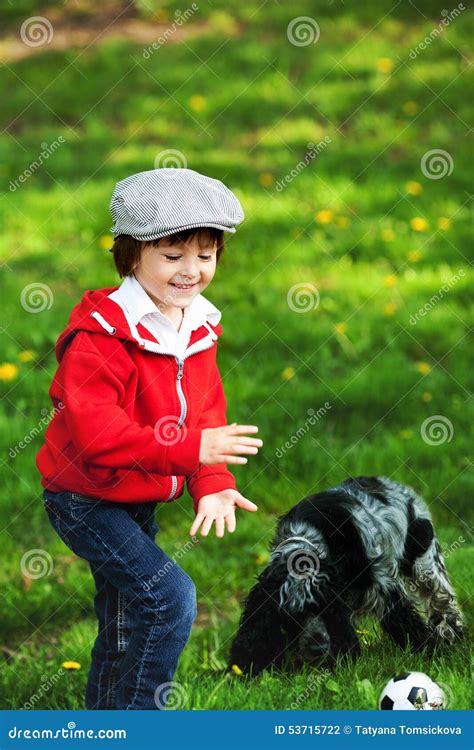 Cute Laughing Boy and His Dog, Playing in the Park, Springtime Stock ...