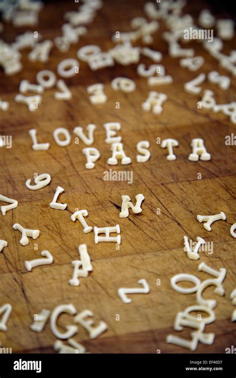 Love And Pasta Spelled With Alphabet Noodles Stock Photo Alamy