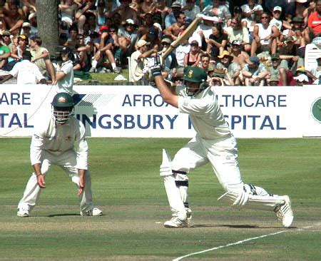 Graeme Smith Drives Through The Covers As Shortleg Ricky Ponting Looks