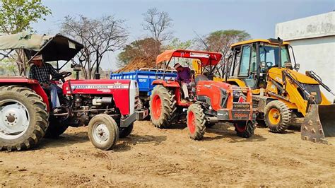 Jcb Dx Eco Loading Mud In New Kubota Mu And Massey Ferguson