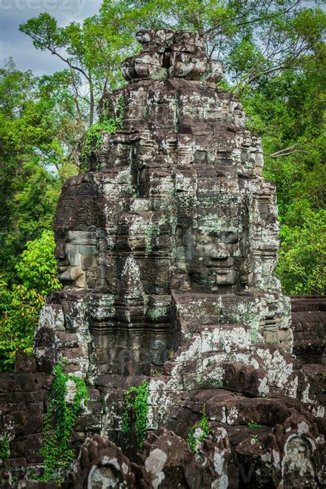 Ancient Stone Faces Of Bayon Temple Angkor Cambodia Stock