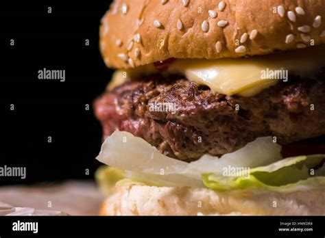 Burger Close Up On Black Background Stock Photo Alamy