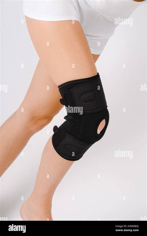 Knee Support Brace On Leg Isolated On White Background Elastic