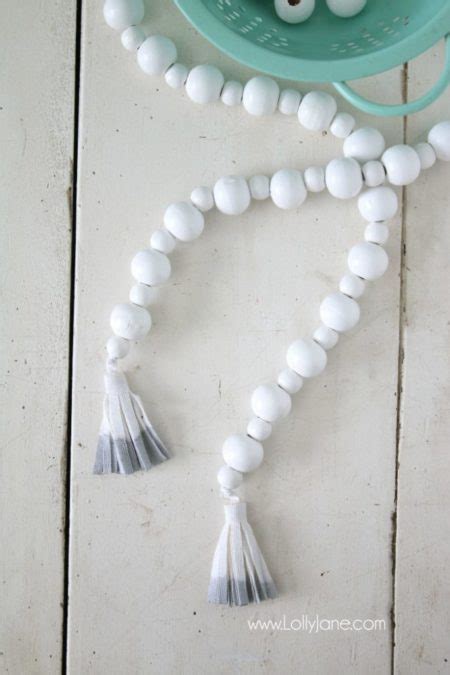 DIY | How to make a wood bead garland - Lolly Jane