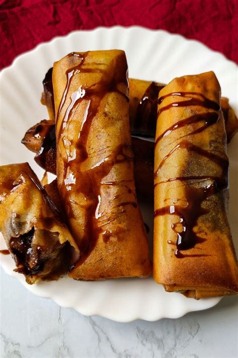 Chocolate Banana Spring Rolls 4 Ingredients And 20 Minutes Dessert Recipe Recipe Banana