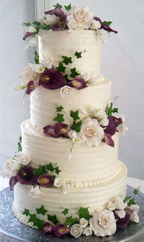 Purple Wedding Cake With White And Purple Flowers