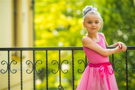 Premium Photo | Little girl in pink dress