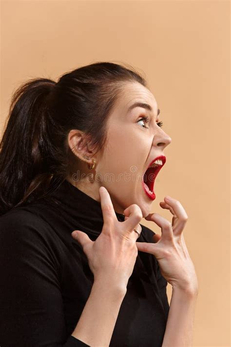 The Young Emotional Angry Woman Screaming on Pastel Studio Background Stock Photo - Image of ...