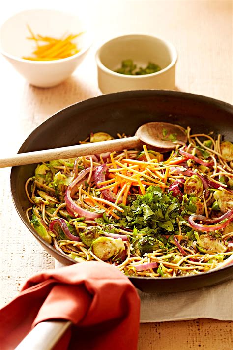 Brussels Sprouts And Noodle Stir Fry With Cilantro And Almonds