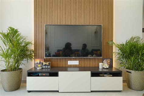 Brown Wall Design With Wooden Details Livspace