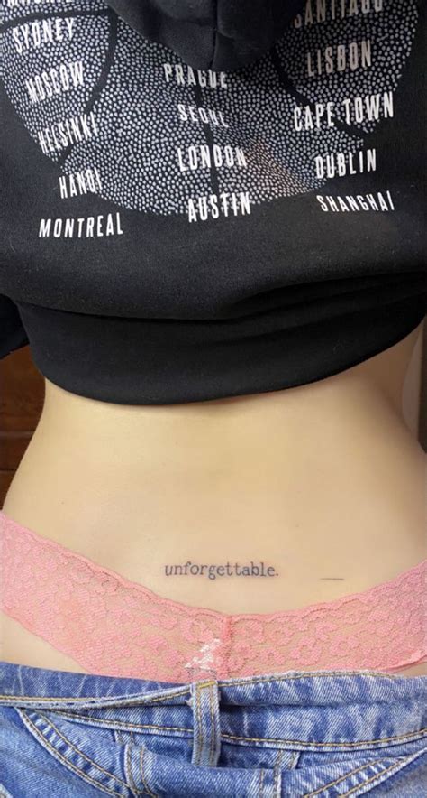 The Back Of A Woman S Stomach With Words Written On It